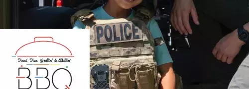 Kid dress in police vest wearing a ballistic helmet
